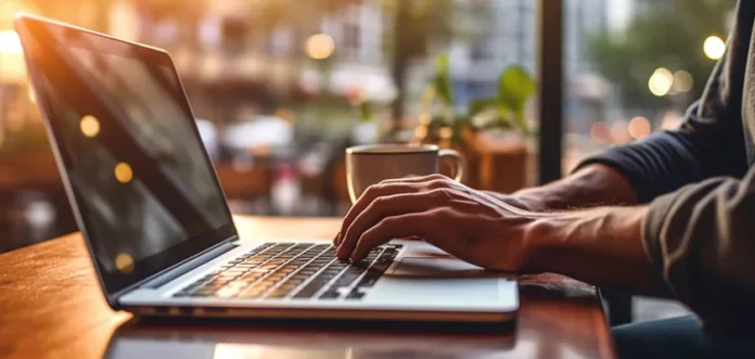 man hand working on computer